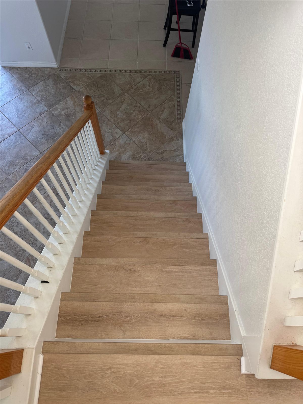 Vinyl stair tread installation on a staircase in Bradenton, FL