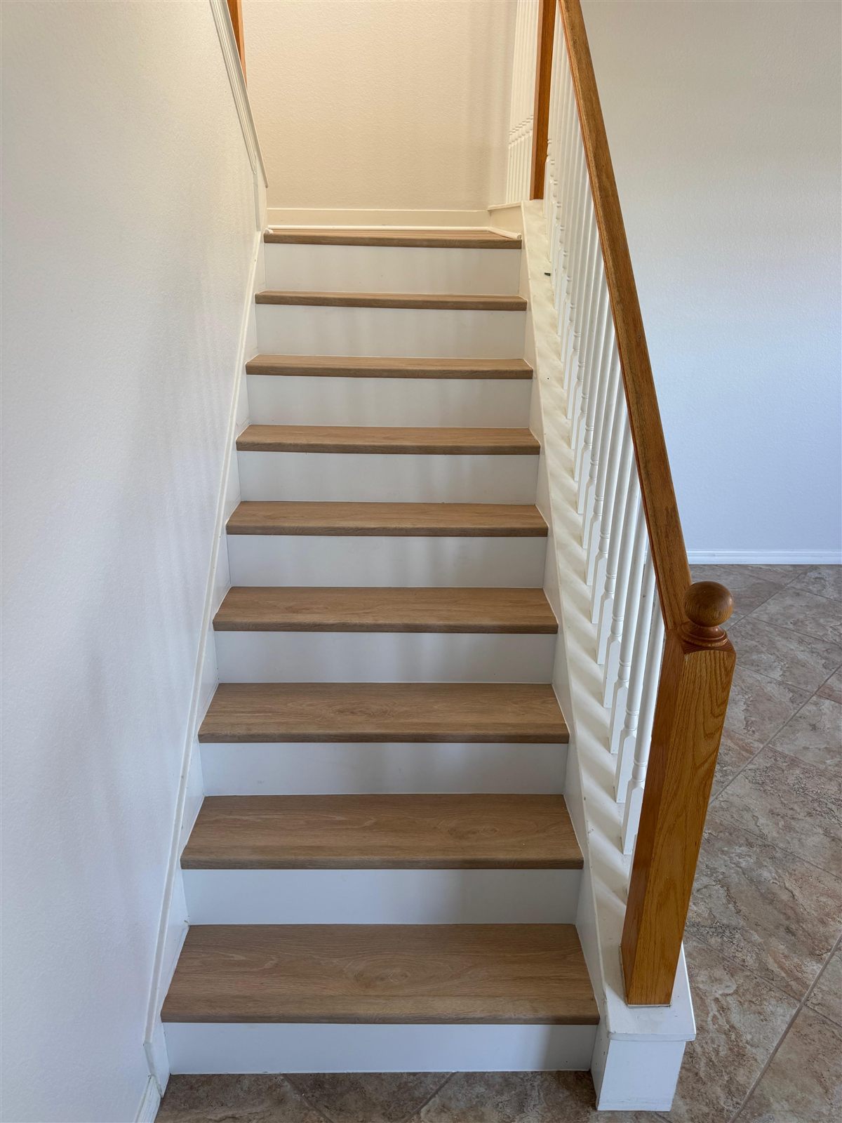 Waterproof vinyl stair treads installed in a Tampa, FL home